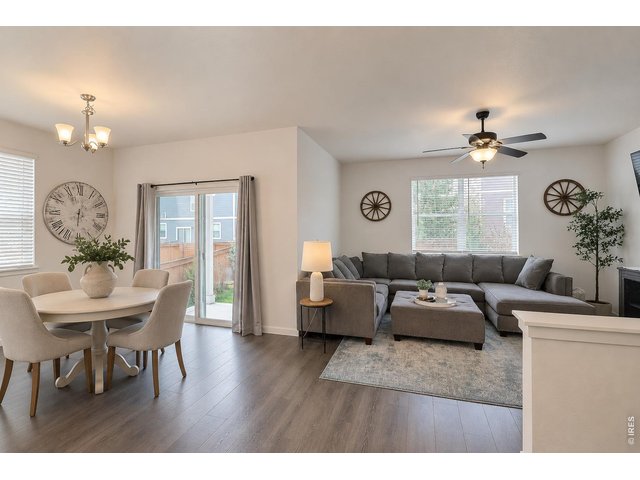 Property Photo 17 Great area for entertaining, sliders for additional space! Photo virtually enhanced