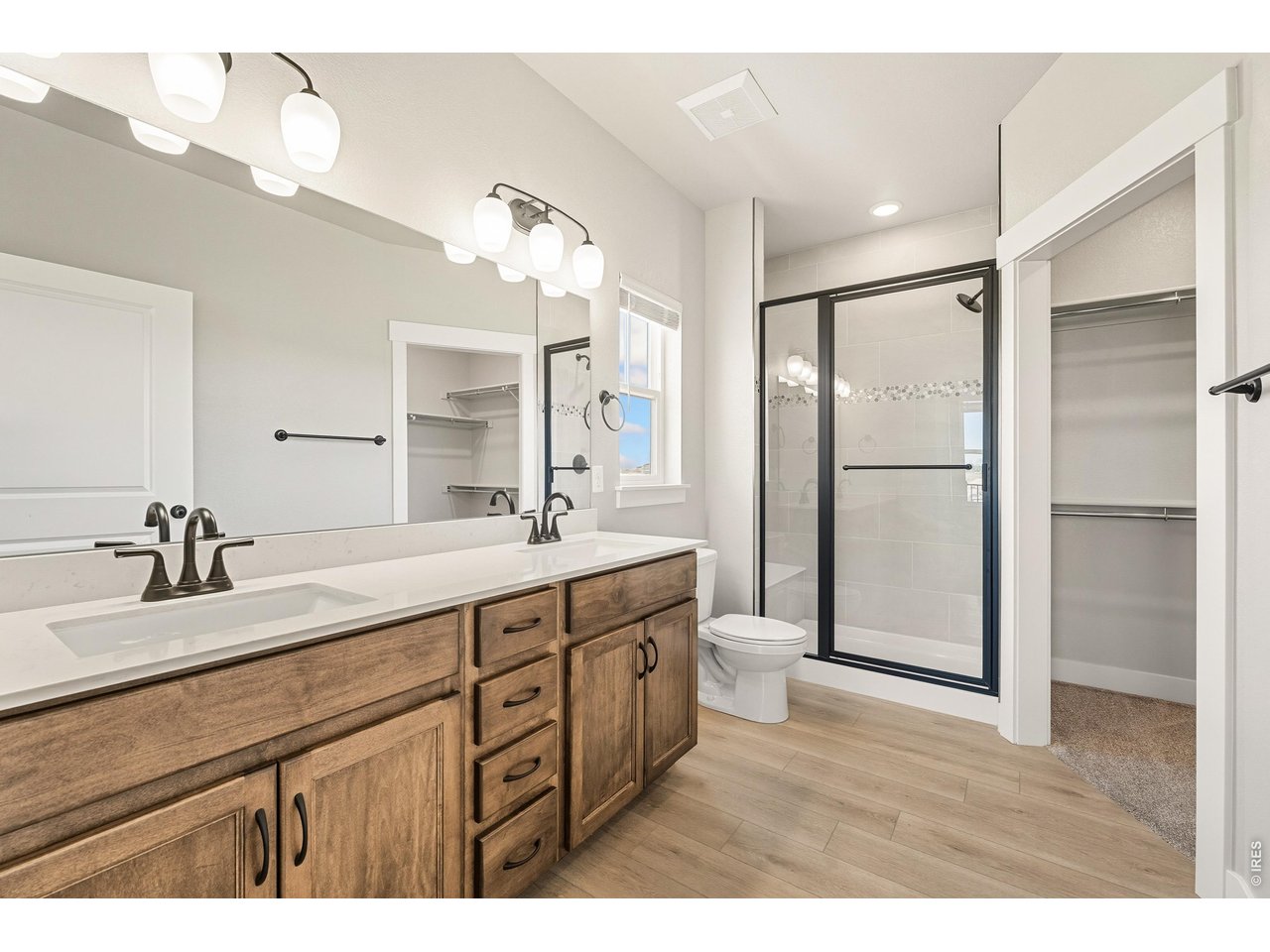 Property Photo 10 Primary bathroom with dual vanities