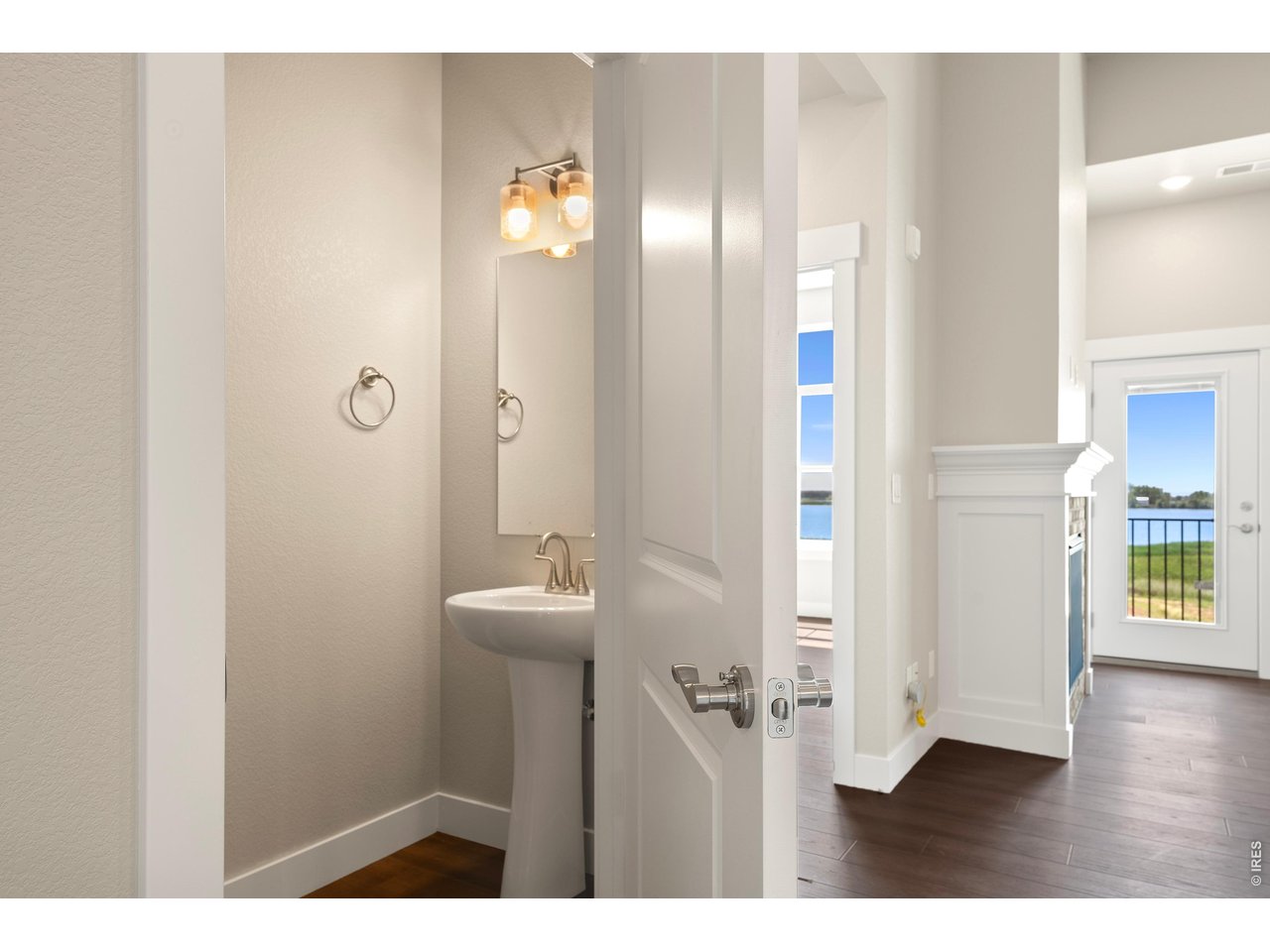 Property Photo 9 Powder bath near the living spaces. 