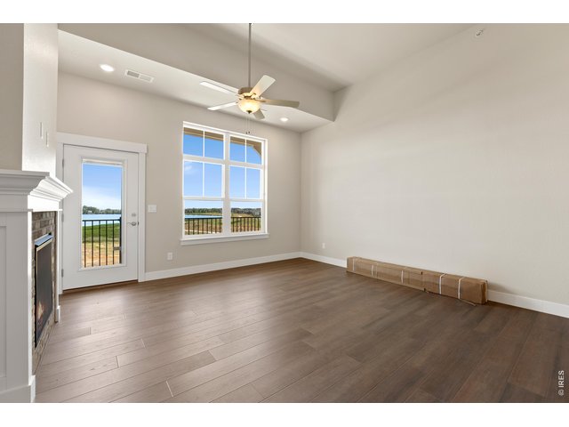 Property Photo 8 Luxury vinyl extended into the living room. 