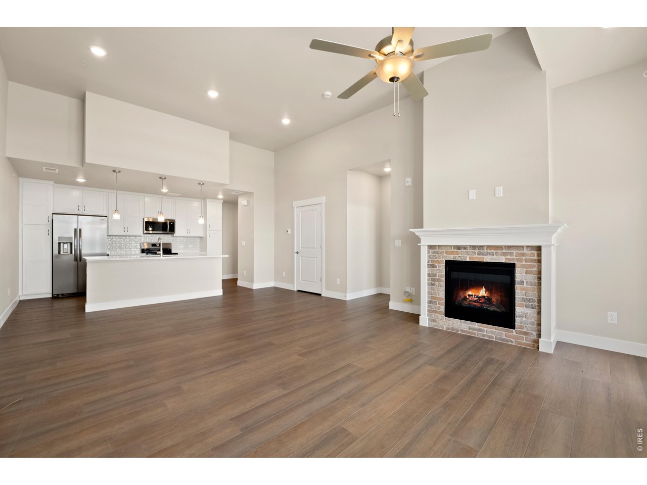 Property Photo 7 Ceiling fan and fireplace included.