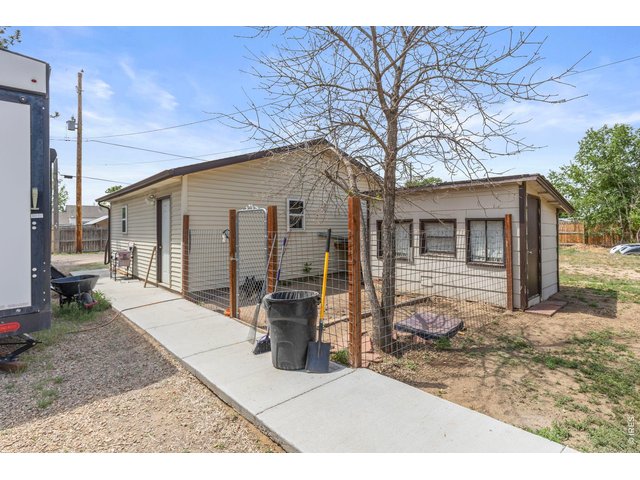 Property Photo 16 Oversized garage and insulated shed