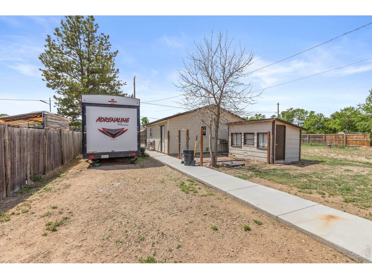 RV Parking, storage insulated shed and oversized 2 car garage.