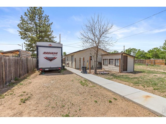 Property Photo 19 RV Parking, storage insulated shed and oversized 2 car garage.