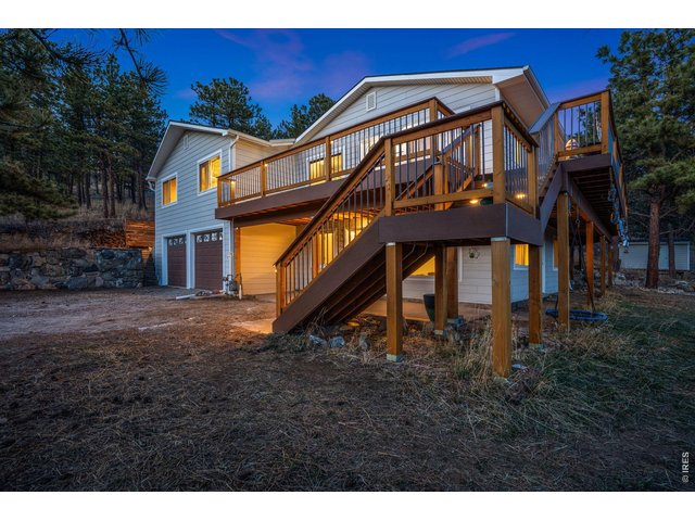 Property Photo 4 Brand new siding and wraparound deck