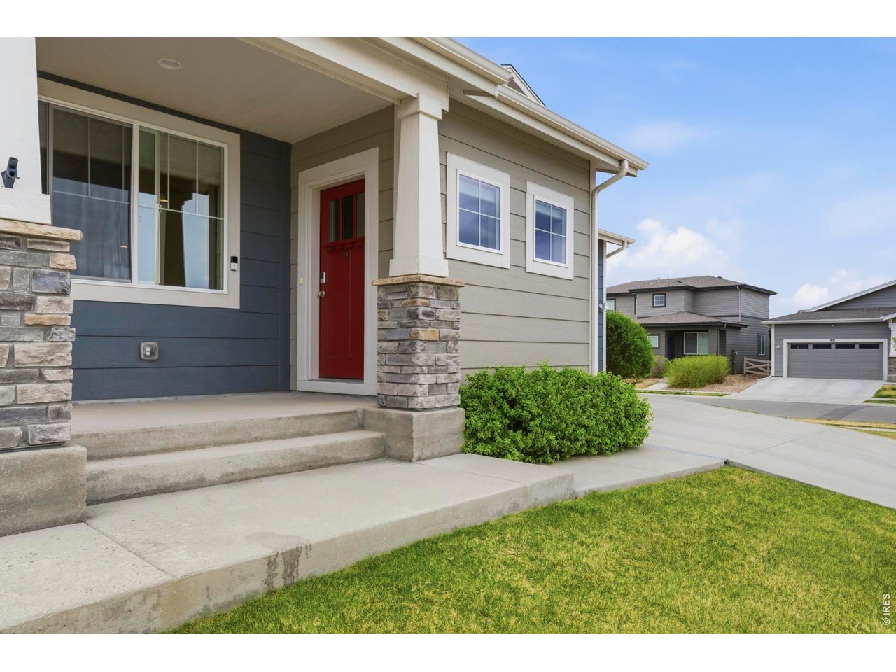 Covered front porch is great for engaging with the neighbors.
