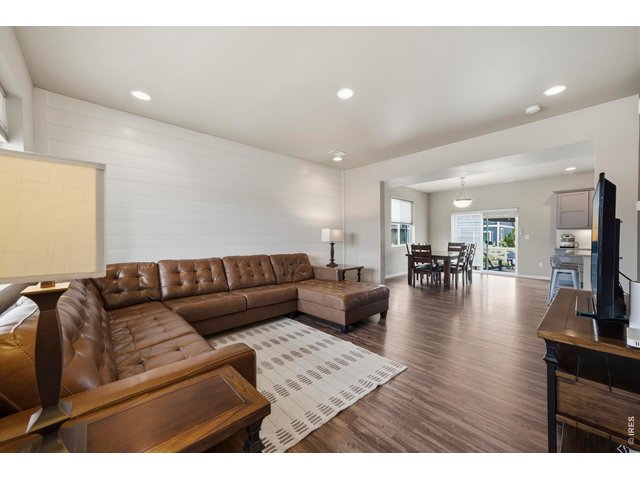 Property Photo 7 Open floor plan leads you from the living room to the kitchen.