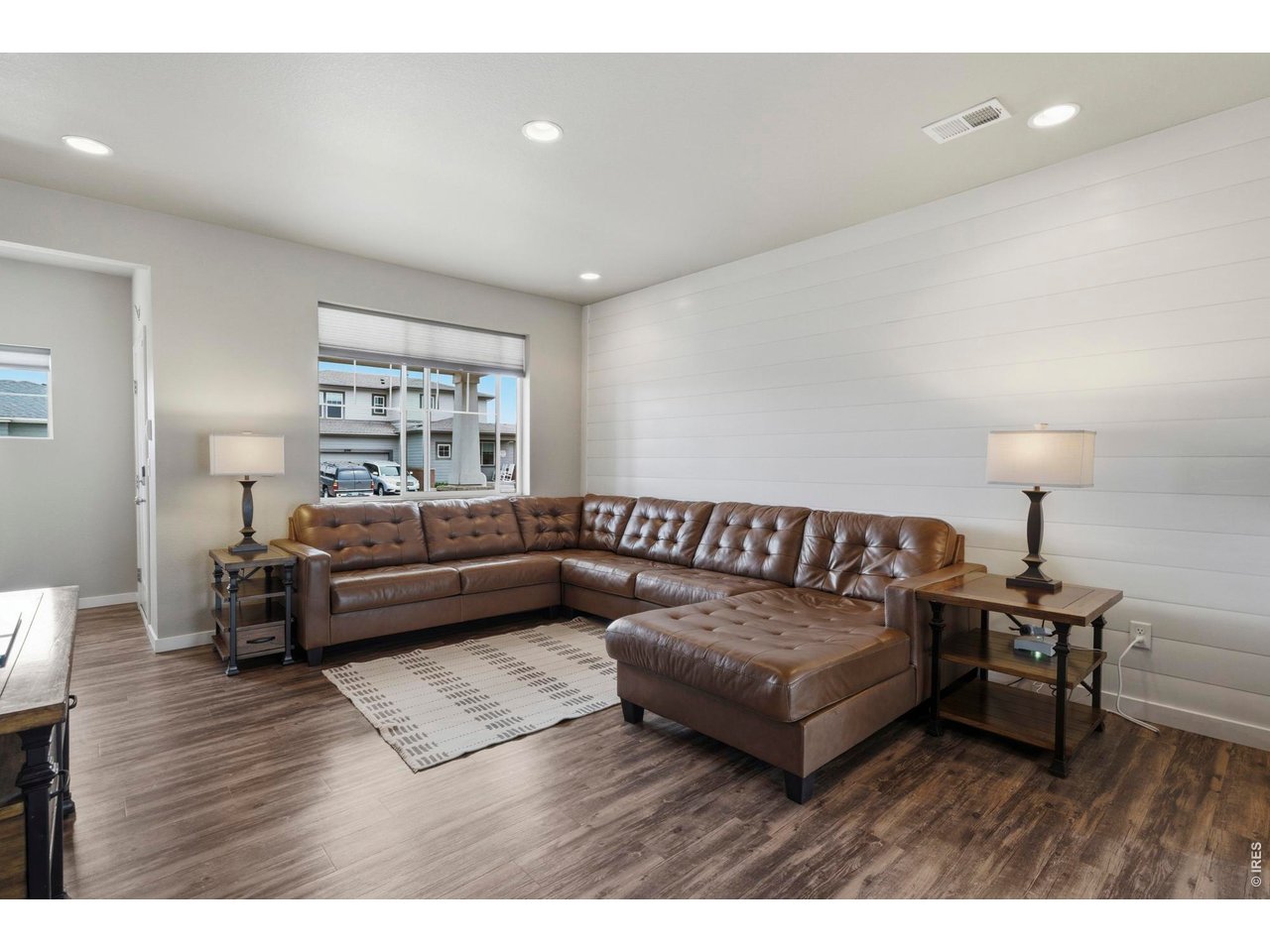 Big front windows help keep this entertaining area bright.