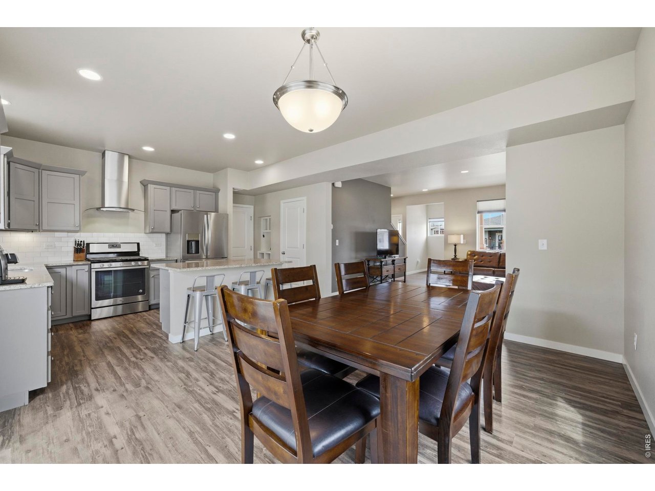 The open concept brings all the entertaining spaces together in a cohesive manner.