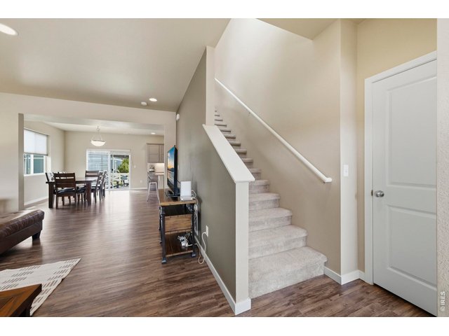 Property Photo 18 Open floor plan leads you from the living room to the kitchen.