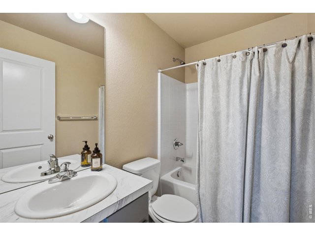 Property Photo 25 Shared full bathroom for the two extra bedrooms.