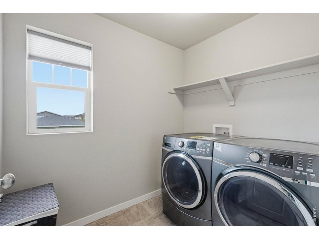 Property Photo 27 Upstairs laundry adds convenience to all bedrooms.