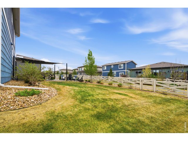 Property Photo 29 An expansive yard still provides a great space for pets and kids.