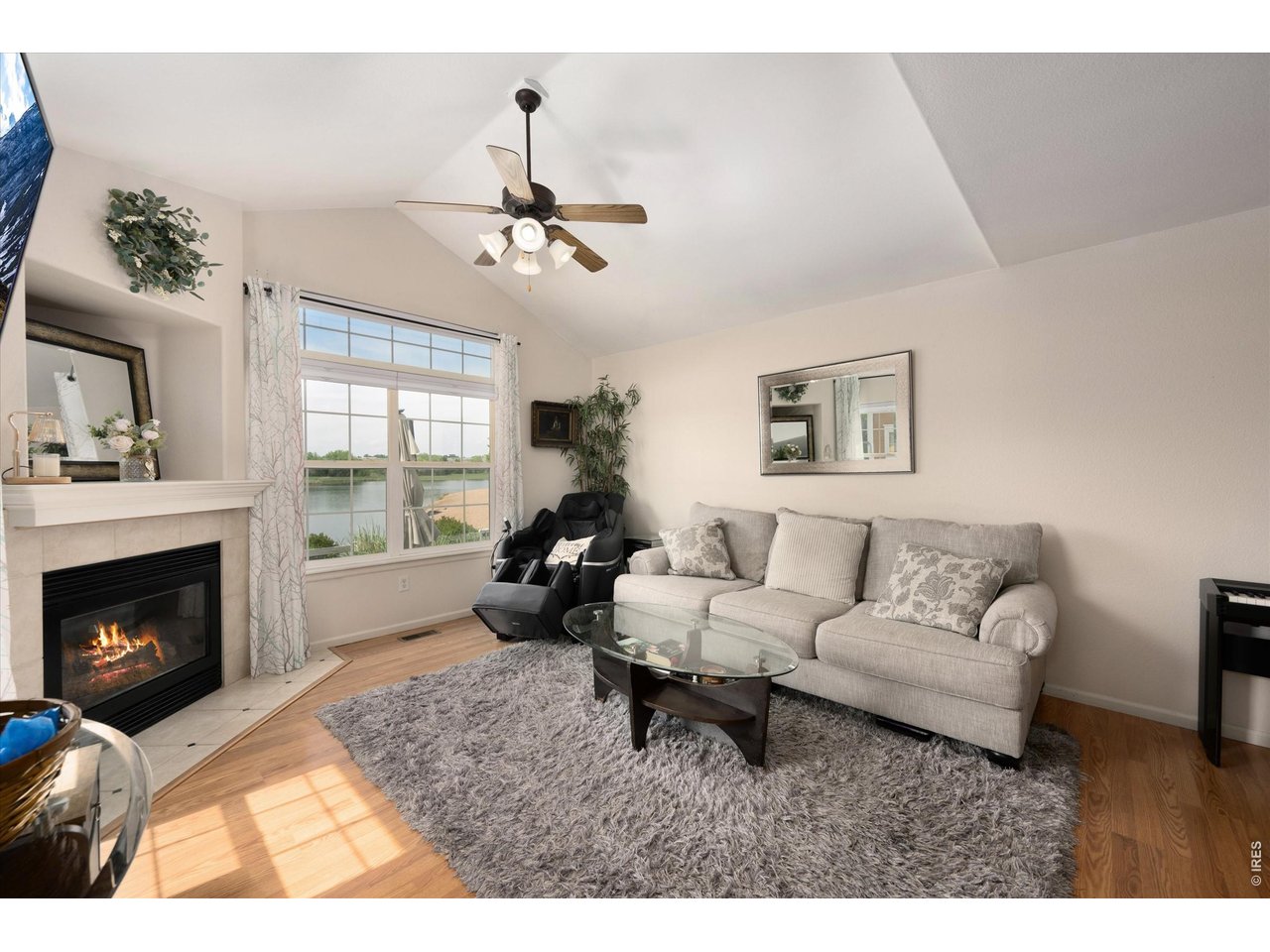 Gas Tiled Fireplace, Wood Flooring Throughout Main Level