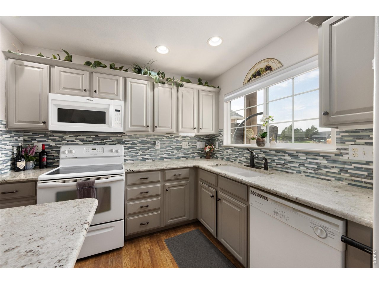 Neutral Cabinets with Canned Lighting