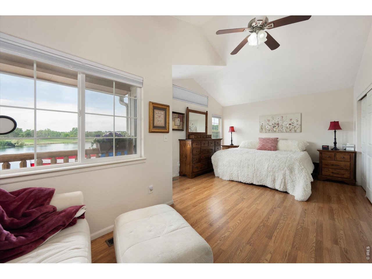Large Primary Retreat with Wood Flooring, Vaulted Ceilings, & Numerous Windows!