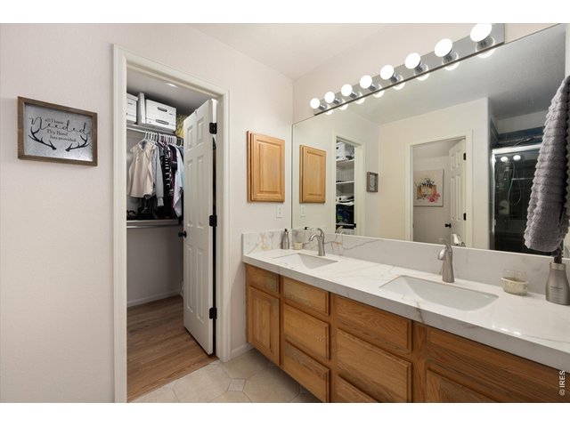 Property Photo 31 Primary En Suite Bathroom with Dual Sinks & Walk In Closet