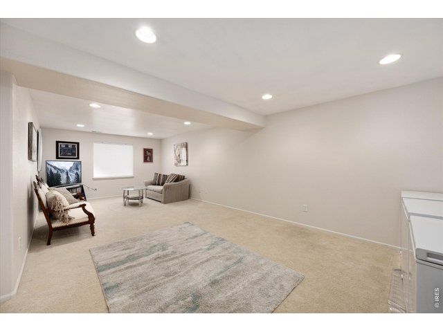 Property Photo 39 Finished Basement with Large Rec Space, Canned Lighting making it Feel Light & Bright!