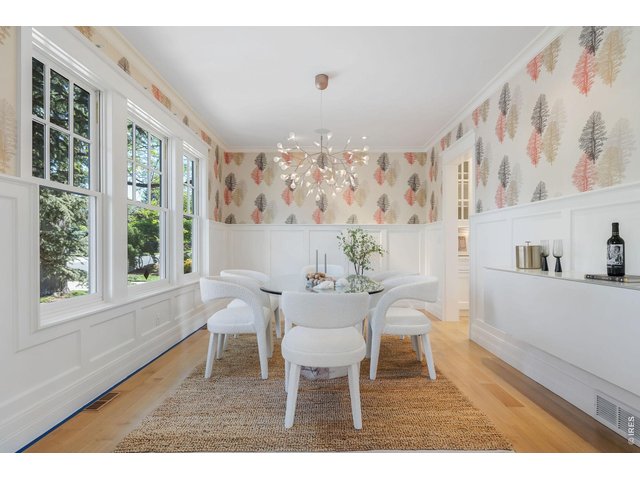 Property Photo 10 The formal dining room connects to beautifully appointed butler's and storage pantries.