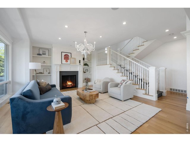 Property Photo 9 Elegant formal and informal living spaces are thoughtfully designed for both grand-scale entertaining and everyday comfort.