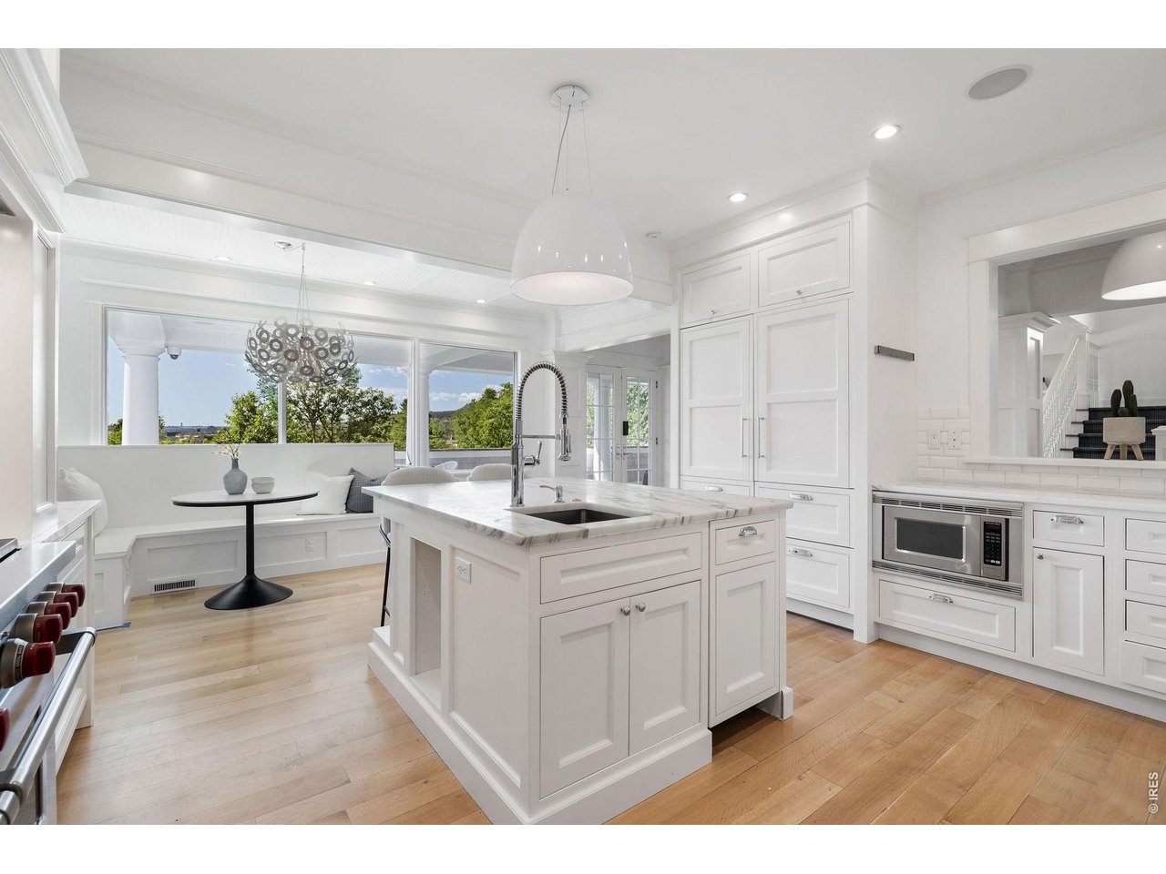 Oversized kitchen island and a charming breakfast nook. 