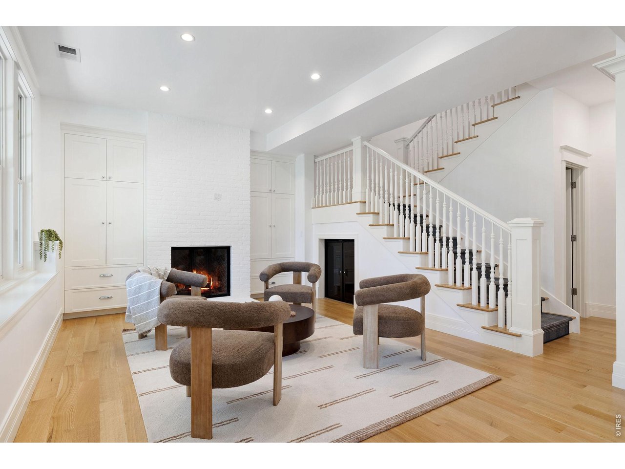 Cozy family room centered by the gas fireplace