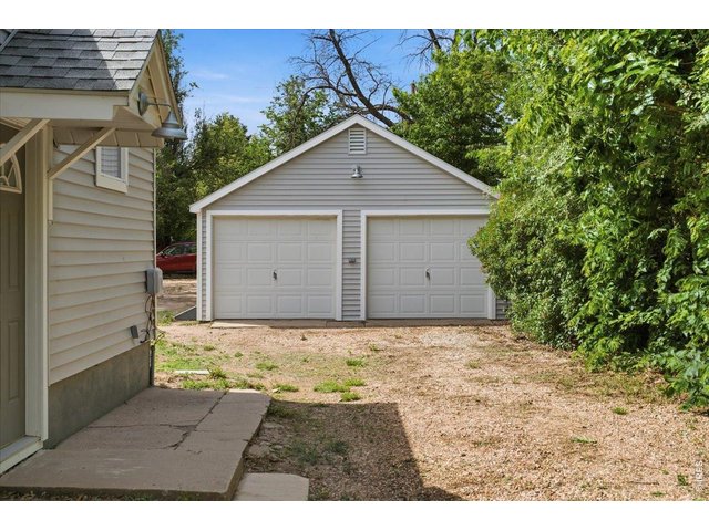Property Photo 29 New siding, roof, steel door and electrical service added to detached garage. 