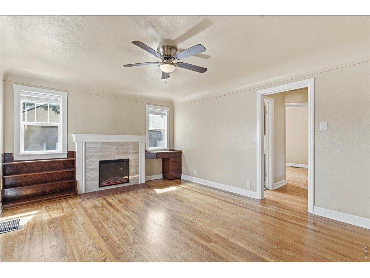 Upstairs living room with refinished oak floors