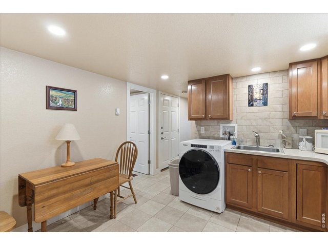 Property Photo 23 Basement unit kitchen and dining area