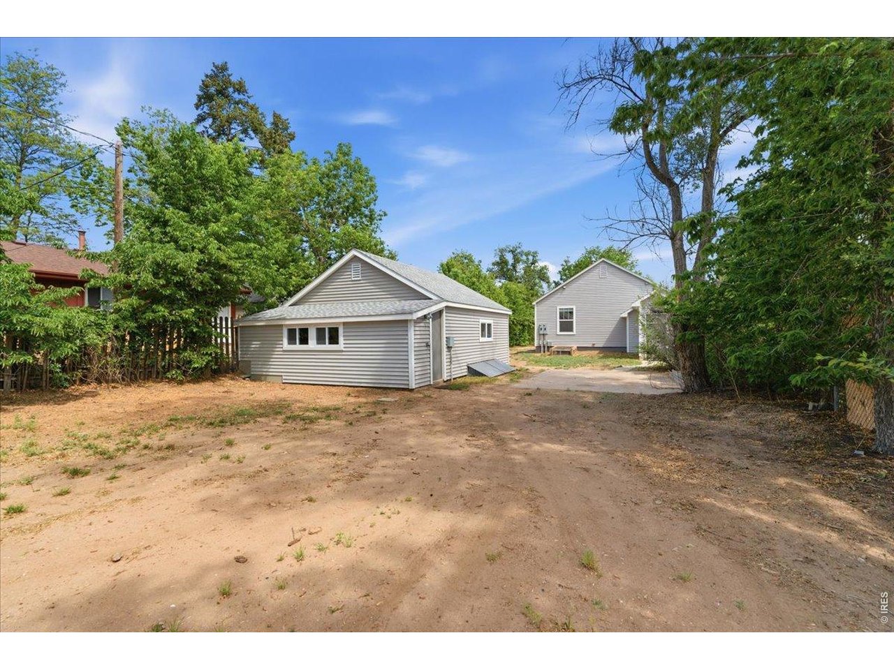 Additional storage sheds off of garage