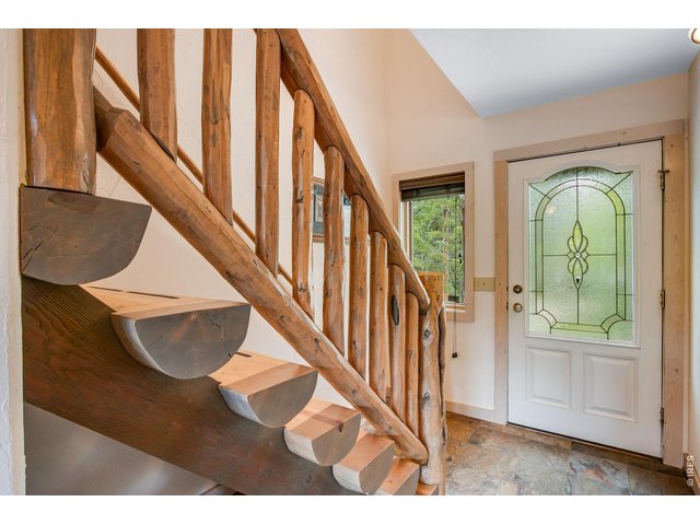 Property Photo 39 Split log stairs off of main entry