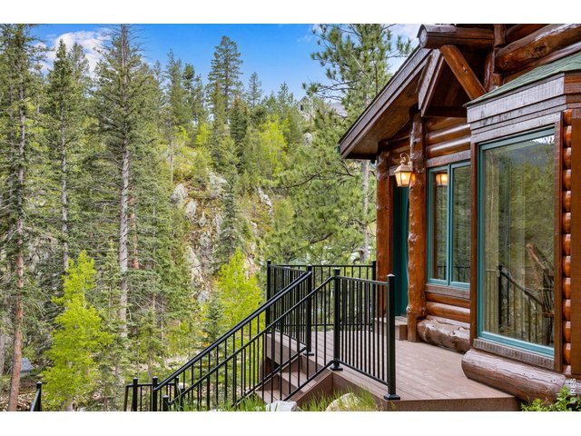 Property Photo 9 Nestled among mature trees 