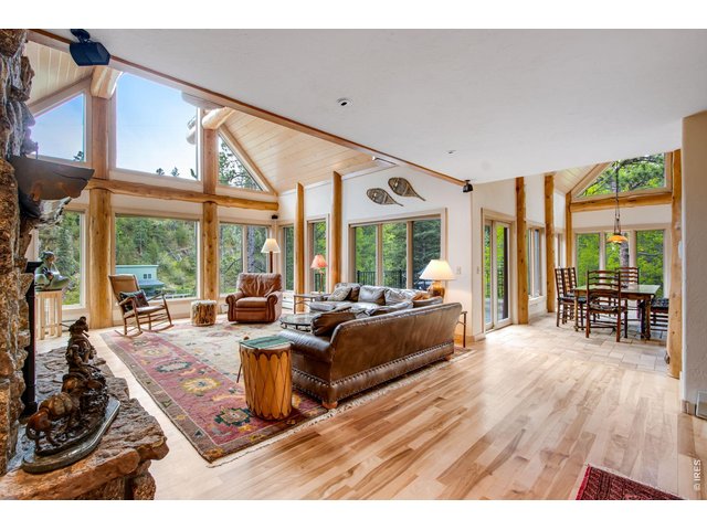 Property Photo 19 Floor to ceiling picture windows frame amazing views and let in plenty of light