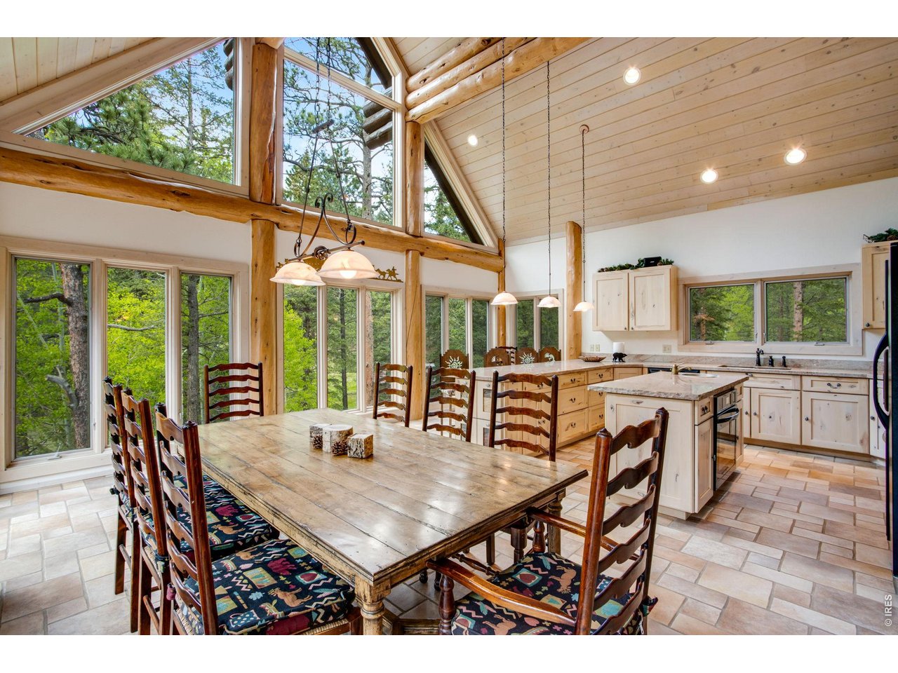 Property Photo 21 Another wall of picture windows grace the dining room and kitchen