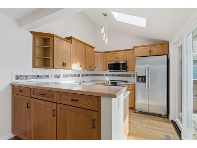 Property Photo 10 Maple cabinets and open floorplan