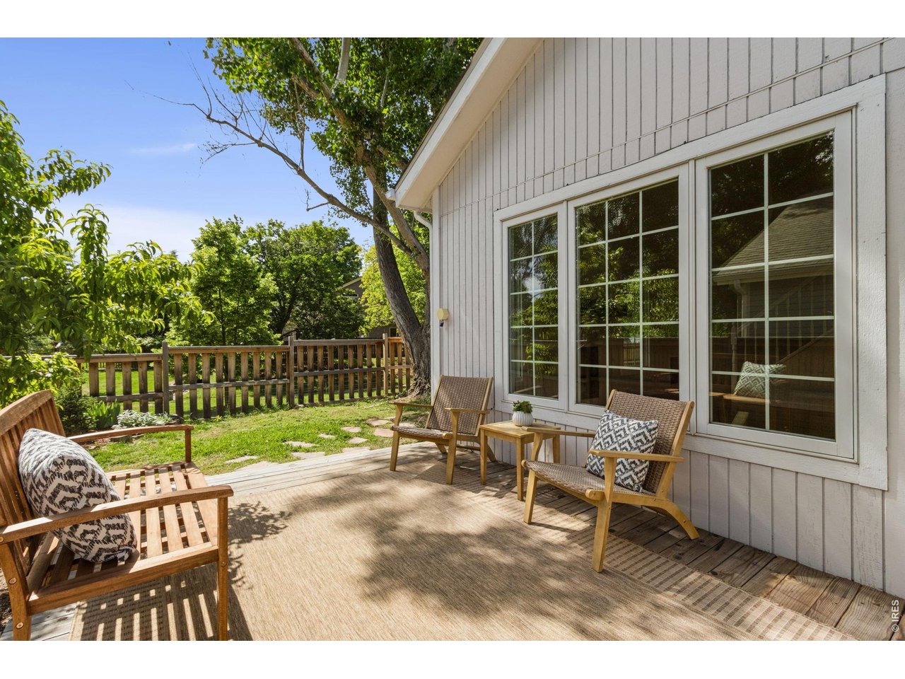Deck and great landscaping on this fully fenced corner lot backing to open space.