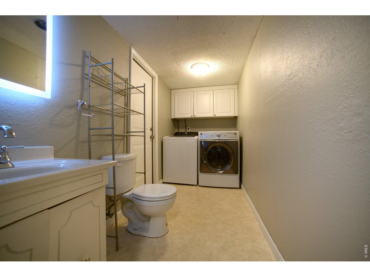 Downstairs bath and laundry with access to the garage
