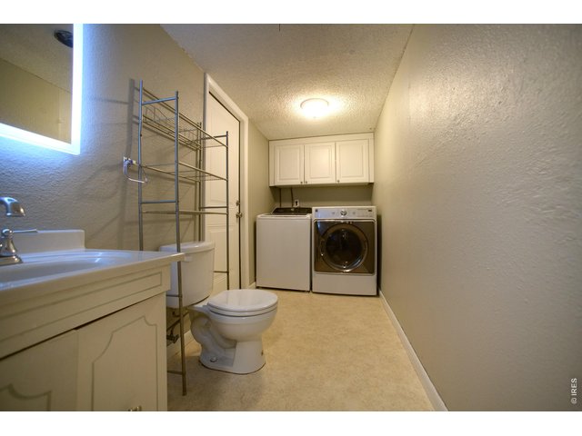 Property Photo 31 Downstairs bath and laundry with access to the garage