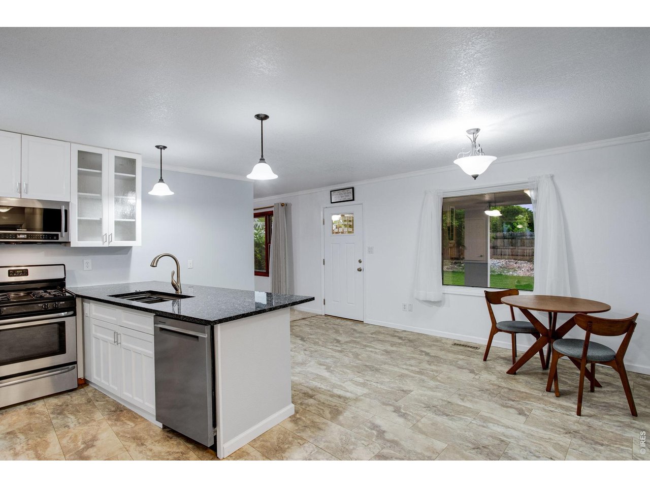 Granite slab countertops with a breakfast bar 