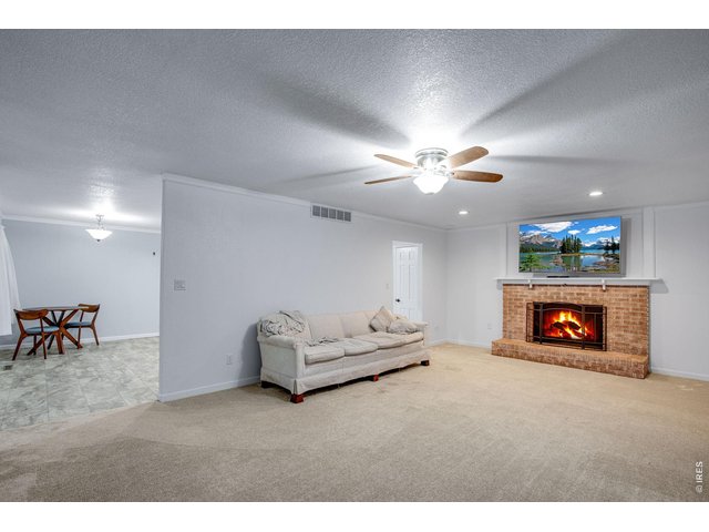 Property Photo 18 Ceiling fan plus central AC for summer comfort. Fireplace and Forced air heat for the winter months. 
