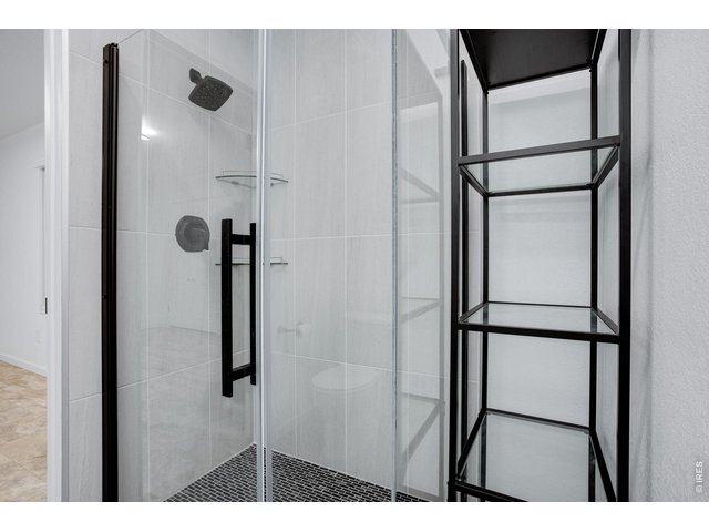 Property Photo 25 Private 3/4 primary bedroom bath 