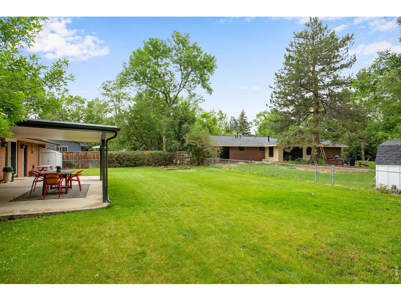 Lush and with established landscaping all around! Ready for Summer Outdoor BBQs here, 430SQFT covered patio! 