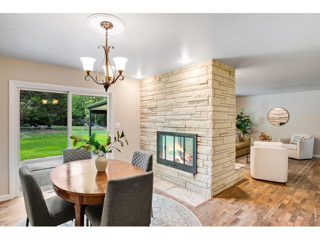 Property Photo 12 Easy transition to the covered back patio from the dining area - perfect for BBQs. 