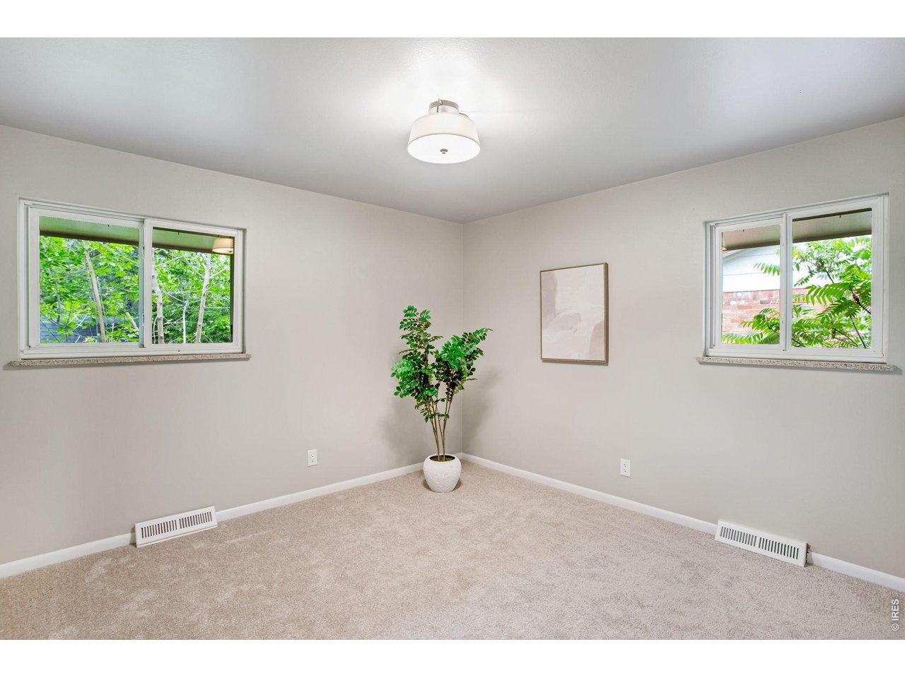 Spacious & Comfortable Secondary Bedrooms, new lighting, plush carpet, new interior paint. 