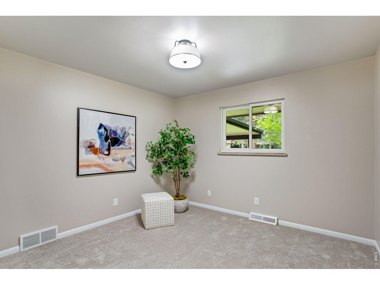 Other secondary main level bedrooms, dressed in new carpet & paint 