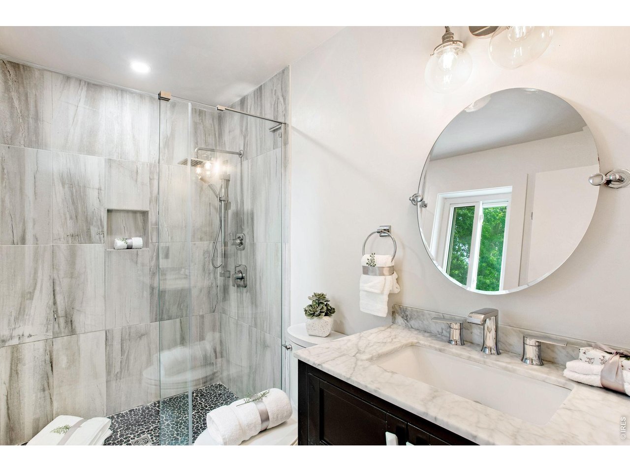 Updated Primary Bath with Elegant Tile Design