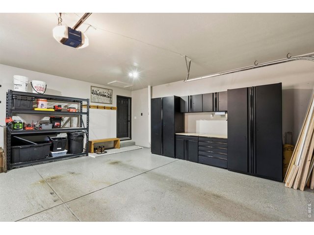 Property Photo 30 Garage cabinetry system is included.