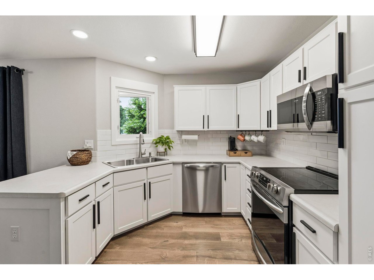Gorgeous refaced cabinetry with updated SS Appliances