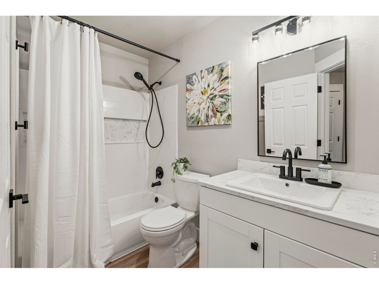 Main level hallway bathroom