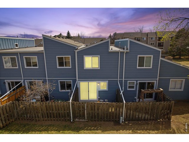 Property Photo 1 Enclosed back patio opens up to the greenbelt for easy playtime with your kids or pets.